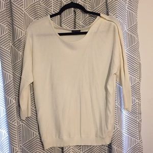 Beautiful cream sweater with gold zippers